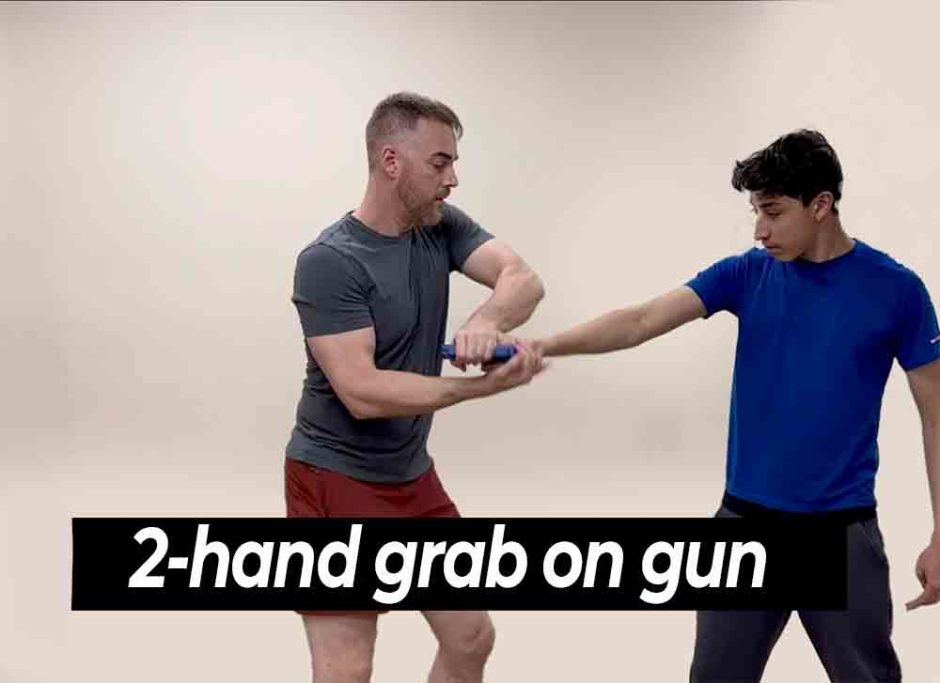 The proper way to do a front gun disarm with both hands and no hitting