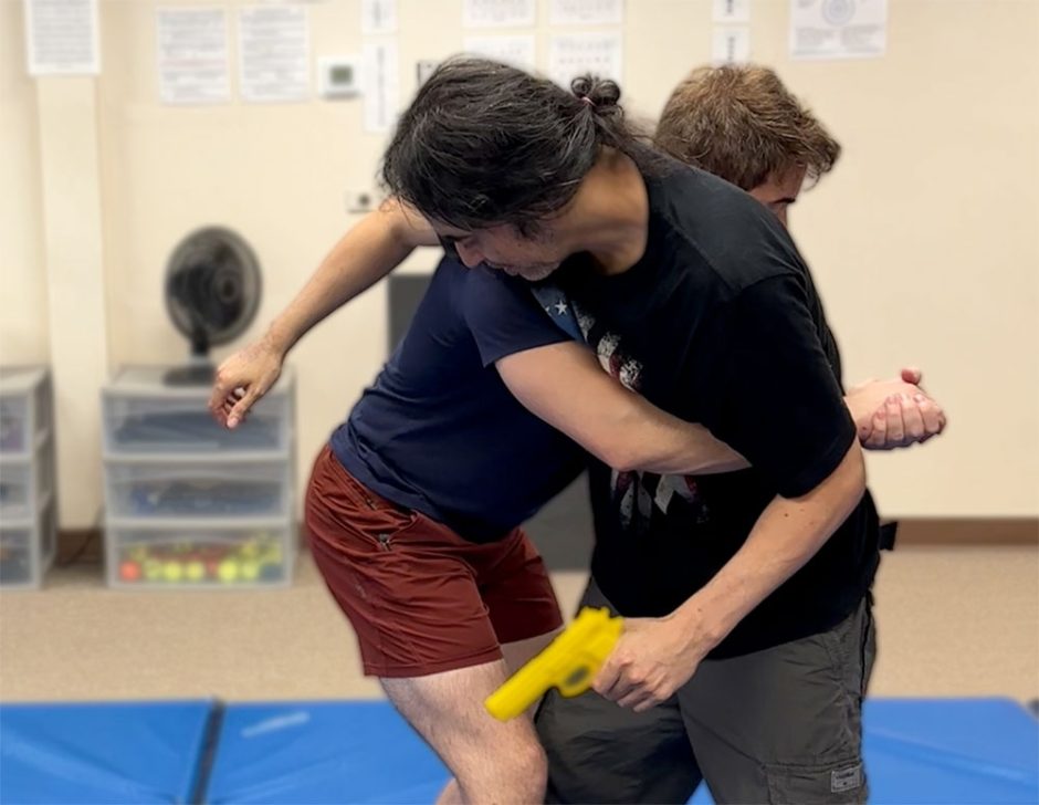 Failed Gun Disarm to Bear Hug